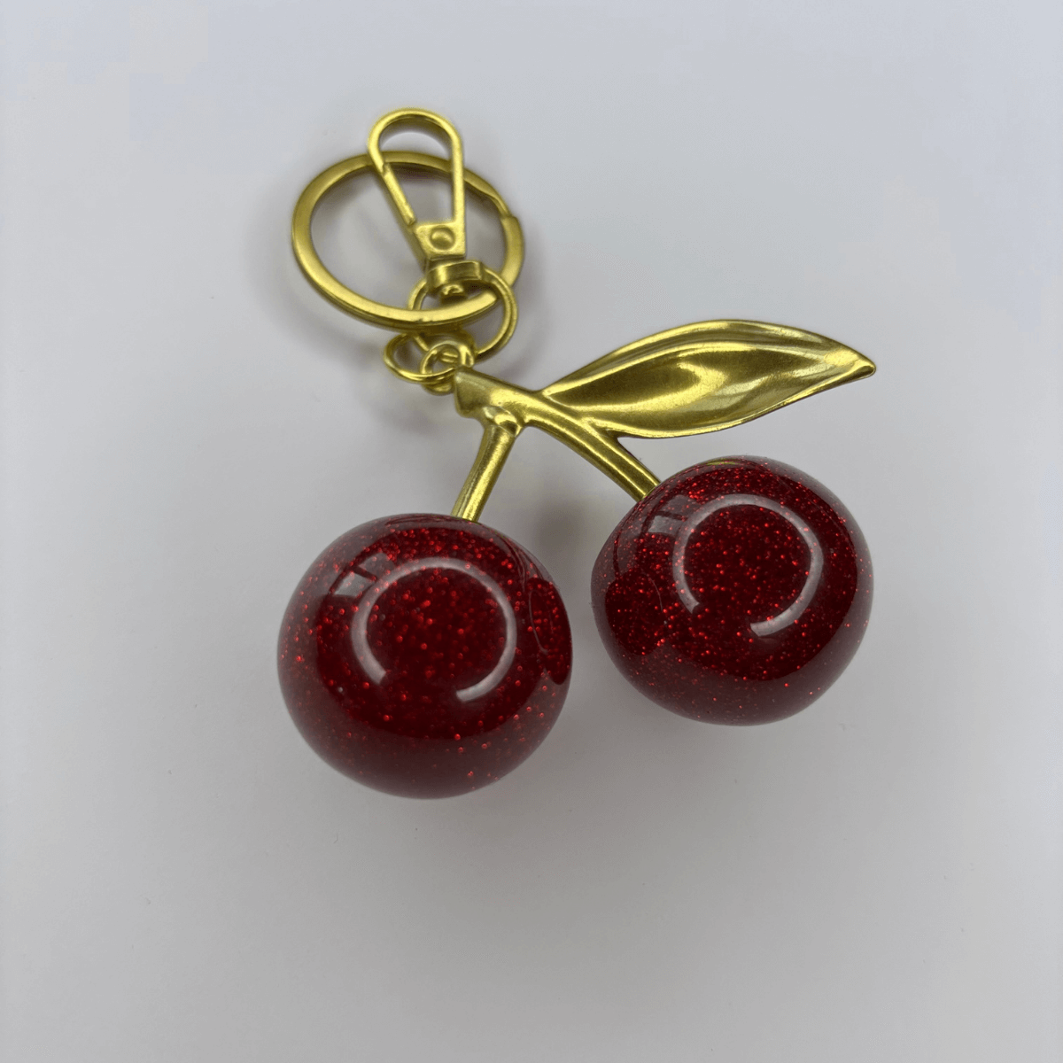 Büyük Kirazlı Altın Yapraklı Çanta Aksesuarı