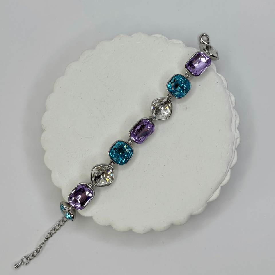 Mavi ve Mor Tonlarında Parlak Taşlı Şekilli Silver İthal Bileklik