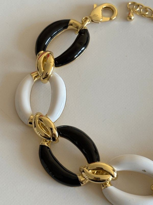 Siyah Beyaz Renkli Altın Detaylı Halka Şekilli Gold İthal Bileklik