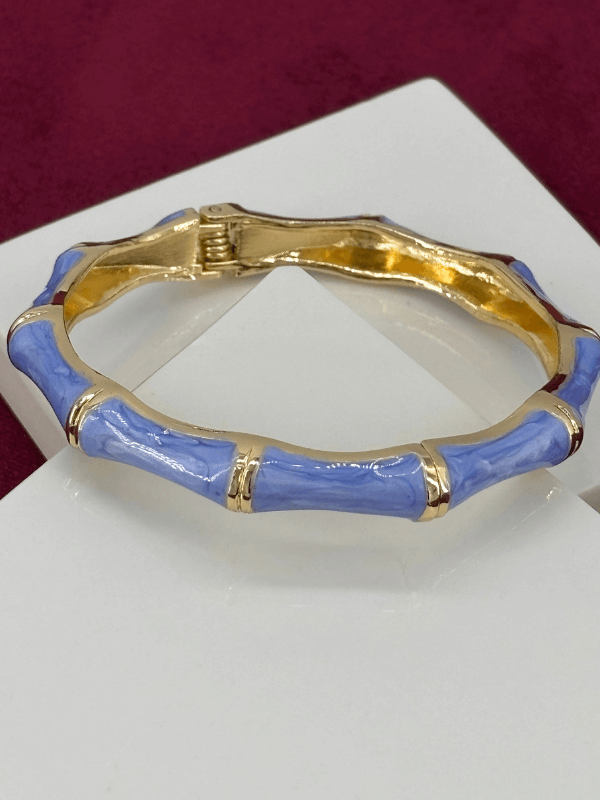 Mavi Sedef Renkli ve Altın Detaylı Kemik Şekilli Gold Kelepçe